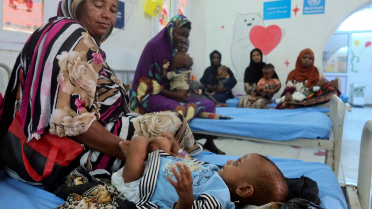 Children, suffering from malnutrition, are treated at Port Sudan Paediatric Centre, during a visit ...